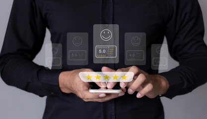 Customer Review, Young Man hand using smartphone mobile with five star to review and give 5 stars...
