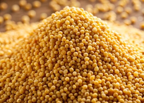 Organic proso millet grains in a heap, their soft, gentle curves radiating warmth and wholesomeness, inviting
