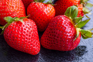 Close up of strawberries. Healthy food and fruits concept