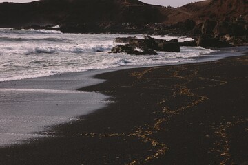  isla de lanzarote  en una playa de arena negra el golfo