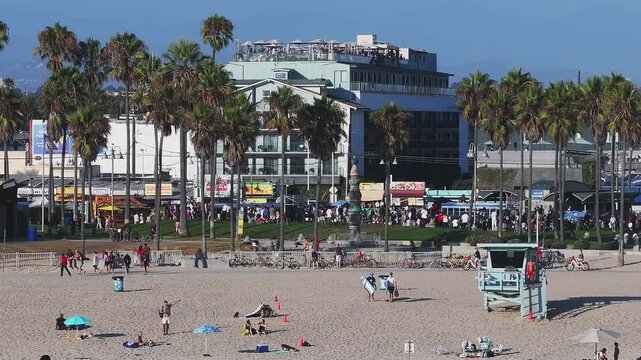 Aerial view of the Venice beach in Los Angeles California, USA. Beautiful summer time at the Venice beach with people enjoying nice weather, beach and the ocean.