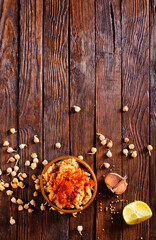 Bowl of hummus dip. Middle Eastern cuisine snack.