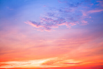 Fototapeta premium Beautiful , luxury soft gradient orange gold clouds and sunlight on the blue sky perfect for the background, take in everning,Twilight, Large size, high definition landscape photo