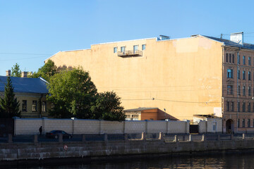 Empty wall of a building on the Fontanka River embankment in Saint Petersburg, Russia.