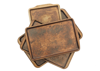 Old baking sheets isolated on white