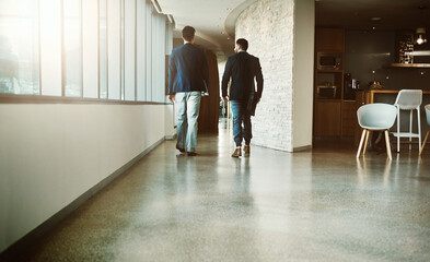 Fototapeta premium Office, teamwork and back of business people for walking, discussion and professional career for corporate. Collaboration, employees and planning in lobby for meeting, morning or arrival in workplace