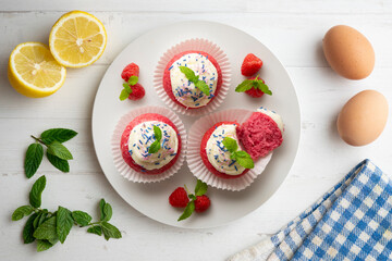 Red velvet muffins with sweet and caramel frosting.