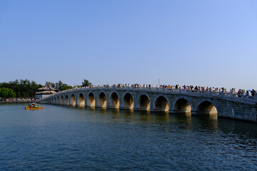 Seventeen-Arch Bridge in Summer Palace in Beijing, China. Traditional ancient Chinese bridge 