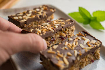 Homemade energy bars made with oats, nuts and chocolate.