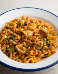 Fideua paella with seafood and squid. Traditional Spanish recipe.