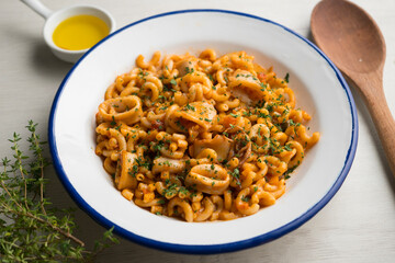 Fideua paella with seafood and squid. Traditional Spanish recipe.