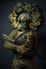 a soldier near a Christmas wreath