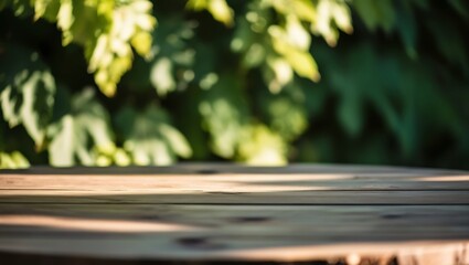 A wooden picnic table in a park surrounded by nature with trees and grass during a sunny day