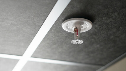 Fire sprinkler on the ceiling with vacuum sealed glass tube.