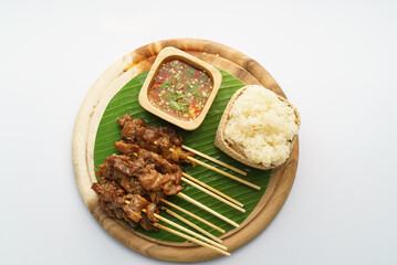 Delicious Thai Grilled Meat Skewers and Sticky Rice