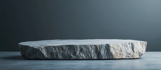 Obraz premium Minimalist Stone Platform on Grey Background - Perfect for Product Display or Design Mockups
