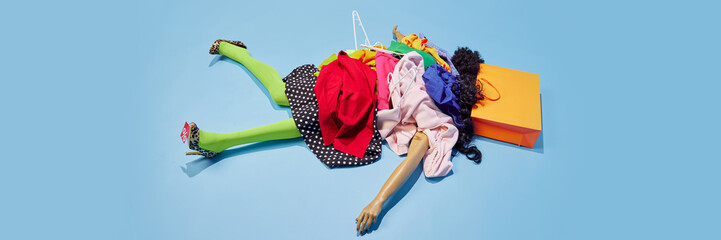 Banner. Surrounded by scattered shopping bags and wild clothes, chaos of Black Friday leaves no...