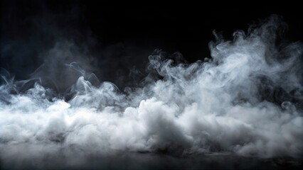 Fototapeta premium Heavy fog passing across a black background, fog, mist, atmospheric, weather, eerie, dramatic, spooky, dark