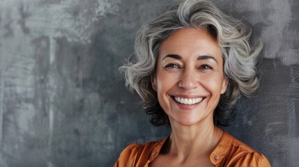 Obraz premium Mature Woman Smile. Portrait of a Successful Hispanic Businesswoman Smiling Happily