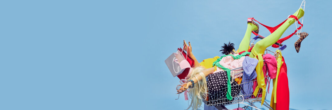 Shopper in cart, filled with clothes and bags, representing excess of Black Friday sales with humorous and exaggerated twist. Concept of sales season, Black friday, holidays shopping. Pop art style.