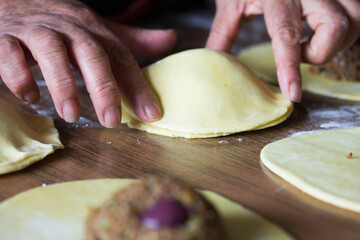 Photograph of meat empanadas preparation.