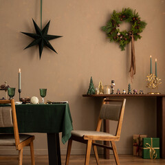 Christmas dining room interior with table, green tablecloth, wooden console, christmas wreath, chair, gifts, candle with candlestick, grown wall and elegant accessories. Home decor. Template.
