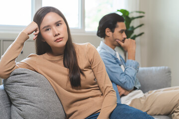Fototapeta premium Breakup and depressed, asian young quarrel couple love fight relationship in trouble. Different people are emotion angry. Argue wife has expression upset with husband. Problem of family people.