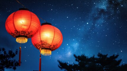 Obraz premium Red Chinese paper lanterns glowing brightly against a starry night sky, with traditional decorations for New Year below.