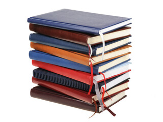 Stack of diaries or books with colorful covers on white background