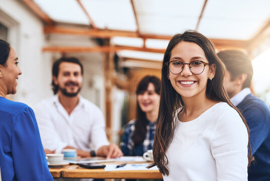 Meeting, startup and business woman in cafe for coffee sales representative, b2b management and team. Caffeine supplier, product specialist and market trends with people in restaurant for portrait