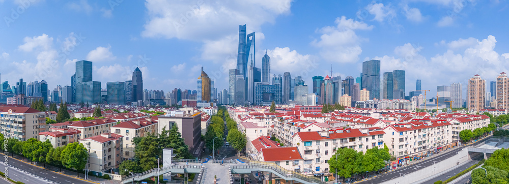 Wall mural aerial view of shanghai downtown skyline, highway roads or street in sunny day