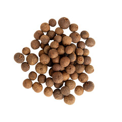 Allspice black peppercorns on empty background