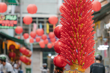 Tanghulu, a popular Chinese treat, consists of fruits coated in a sugary glaze. It's a common sight in street markets across East Asia, offering a delightful combination of sweet and tart flavors.