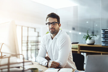 Businessman, portrait and working with desktop as confident in corporate office for deal. Male person, relax and tech in financial agency for equity, stock and finance as investment banker in Germany