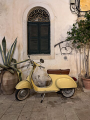 vintage scooter parked in the street Greece Corfu © Serhii