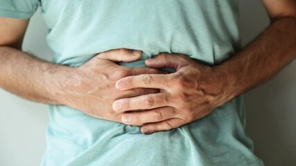 Gastritis, painful stomach inflammation process, adult male in pain, 4K