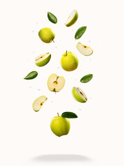 Juicy green apples sliced ​​in slices hover in the air isolated on white background.