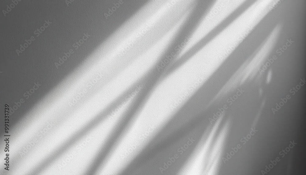 Fototapete Soft Sunlight Casting Gentle Shadows on Textured White Wall. Minimalist Natural Lighting Effect Creating Calm and Serene Atmosphere with Smooth Transition from Light to Shade. Background For Product 