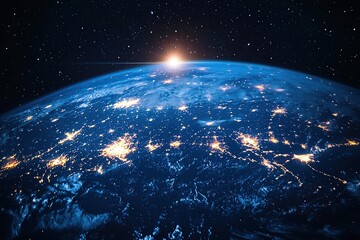 Obraz premium Breathtaking view of Earth from space, showcasing a vibrant planet with city lights illuminating the night sky.