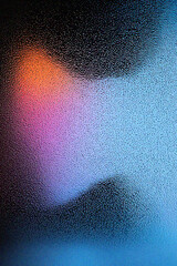 Grainy gradient background, A vibrant abstract image featuring a blurred interplay of colors and textures, created by condensation on a glass surface.