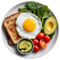 Healthy breakfast plate with eggs, avocado, and vegetables