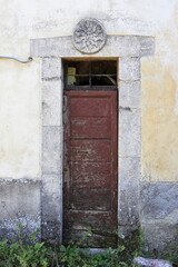 Old Door with Sculpted Frame in Central Italy Countryside Village