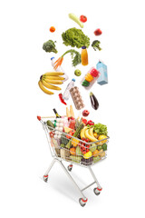 Different food products falling into a shopping cart