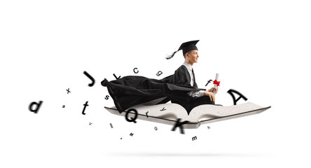 Male graduate student sitting on a book with letters and flying