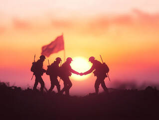 Fototapeta premium Soldiers shaking hands at dawn, symbolizing peace and unity