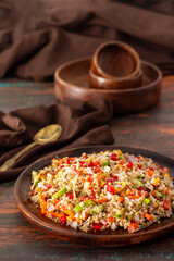 Vibrant Quinoa Salad with Fresh Vegetables, Tangy Citrus Dressing, Crunchy Nuts, Avocado, and a Zesty Herb Infusion.