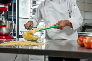 Preparation of artisanal dessert with natural ingredients processed in a dessert workshop.