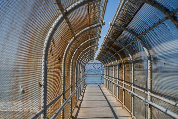 Fenced Cage Freeway Bridge Tunnel Inside POV