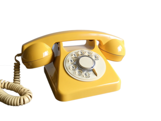 a yellow telephone on a wood surface