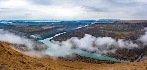 Aerial shot of the morning fogs above Lake Simtustus Central Oregon